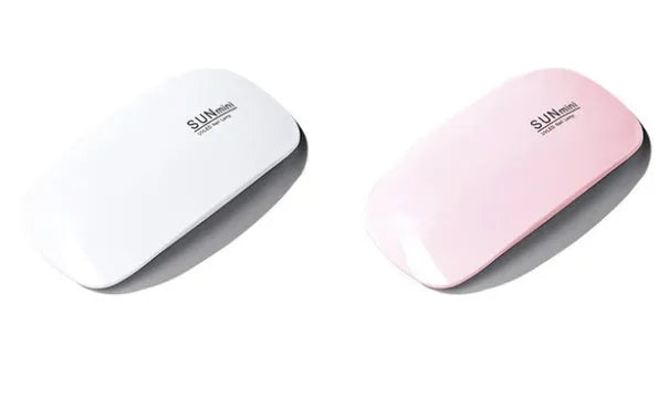 Mini Mouse pink LED phototherapy machine for nail gel curing with 6 lamp beads on a white surface