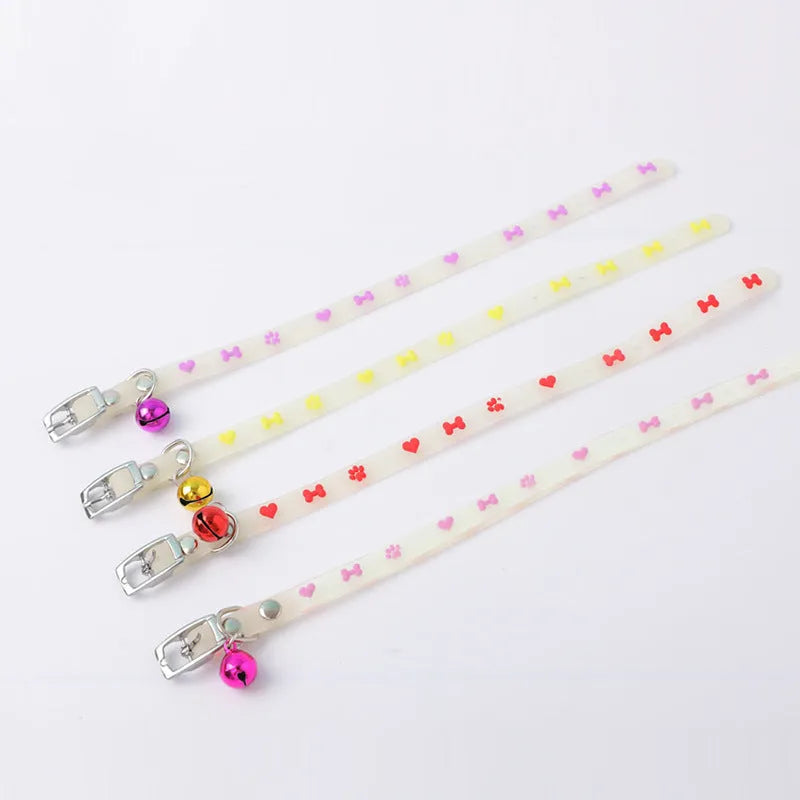 Adjustable luminous cat collar with silicone strap and metal bell in decorative pattern