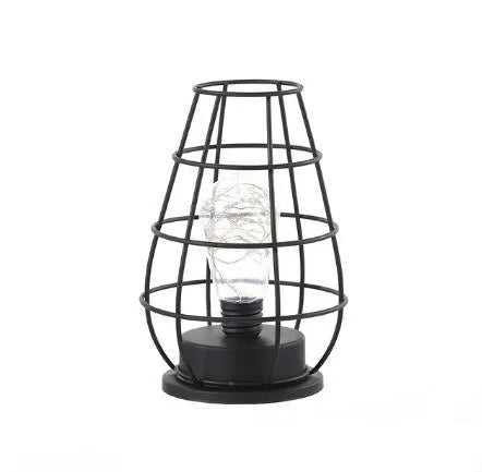 Minimalist hollow iron table lamp in wine glass or bottle design with warm white LED light