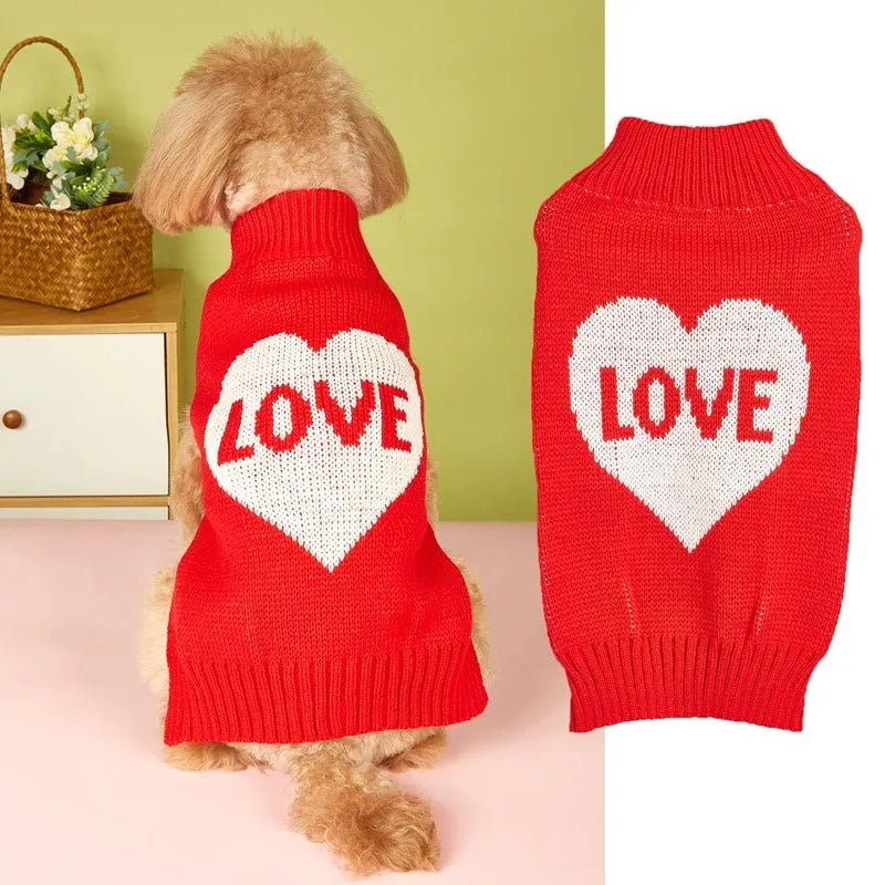 Red dog sweater with a white love heart and bow design on a small dog.