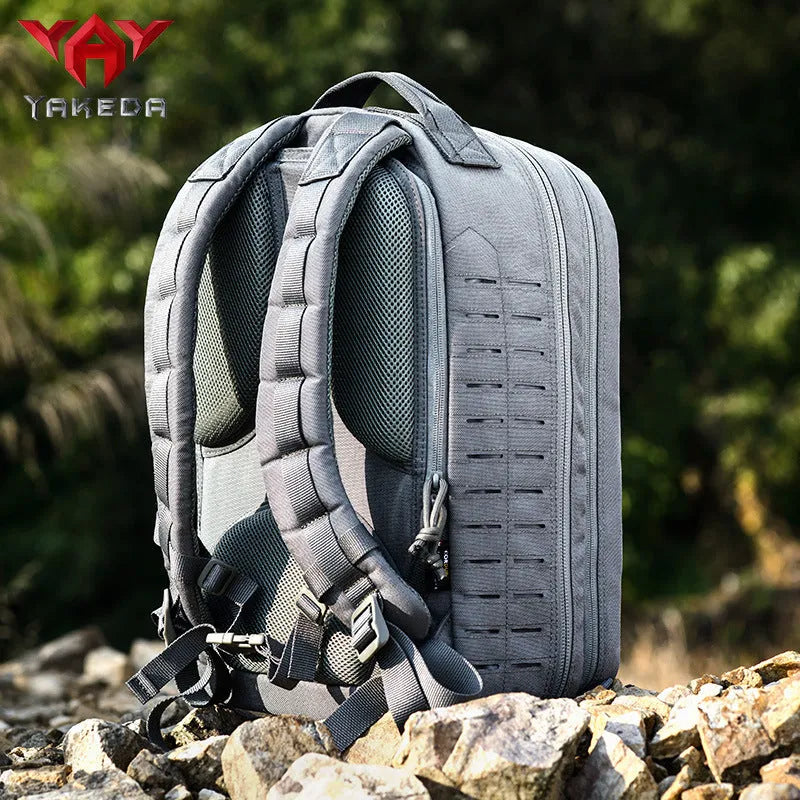 Outdoor hiking backpack in camouflage 600D polyester with 36-55L capacity and ergonomic shoulder strap