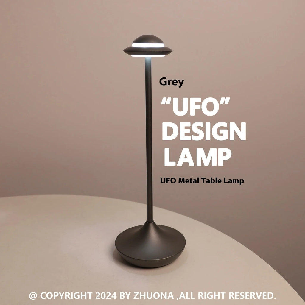 Modern UFO-shaped metal table lamp in black, gold, or grey with touch dimming controls.