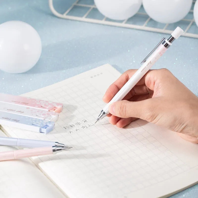 Three cartoon automatic pencils with 0.5mm lead and three boxes of refills