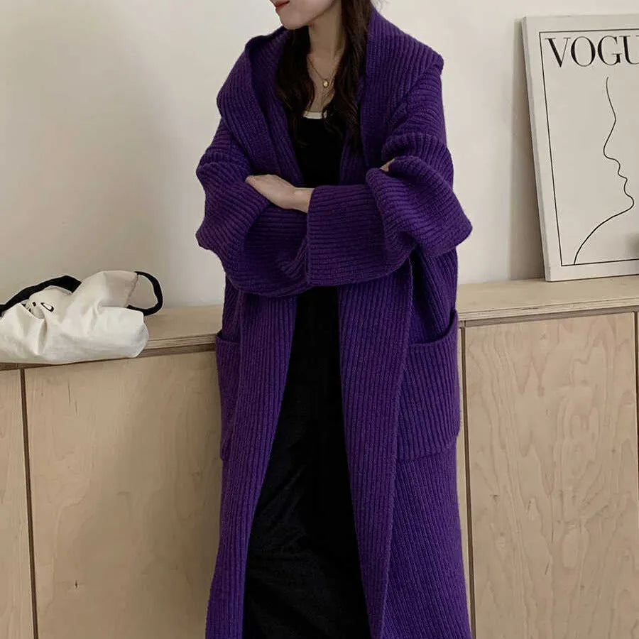 Women's loose hooded cardigan coat in acrylic fabric with raglan sleeves.