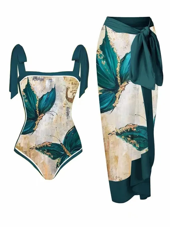 Women's floral print two-piece swimsuit with a sheer chiffon hip skirt, shown in one of the available colour variations.