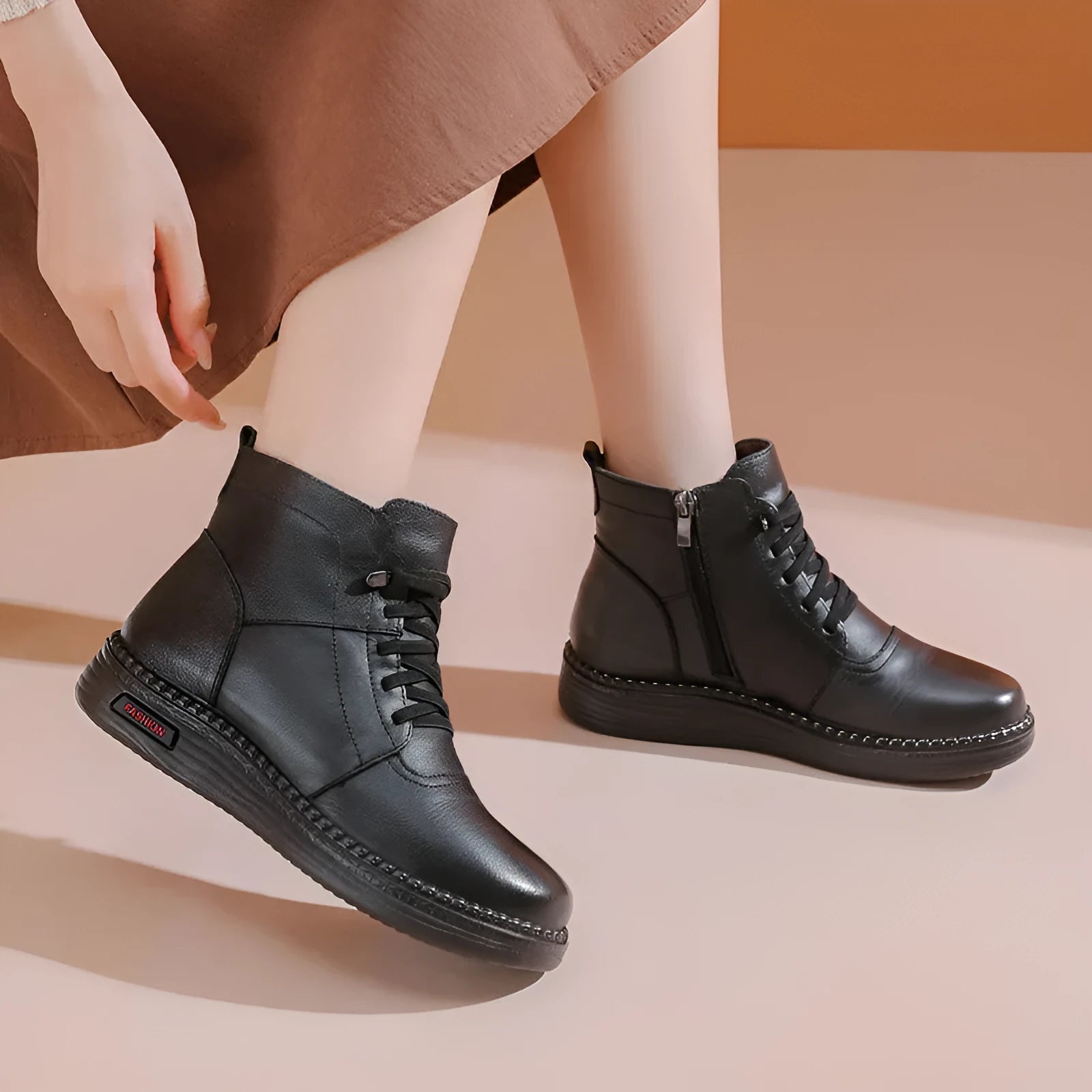 Mother cowhide leather ankle boots with wool lining, platform heel, and side zipper in black