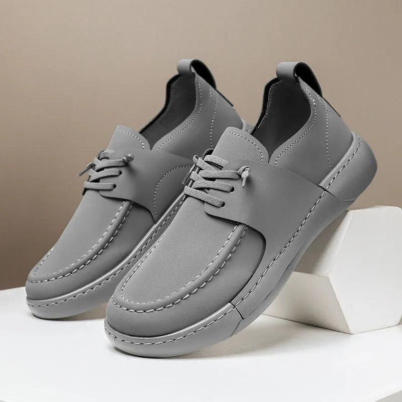 Men's retro British business casual lace-up leather shoes in black with round toe and low heel, stitching detail