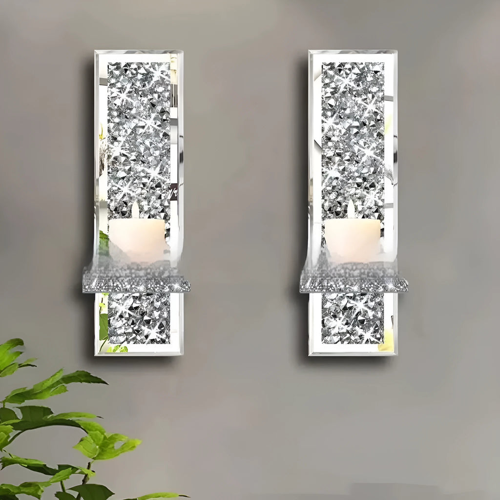 Silver mirror glass wall hanging candlestick pair measuring 38 cm tall