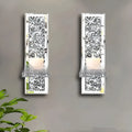 Silver mirror glass wall hanging candlestick pair measuring 38 cm tall