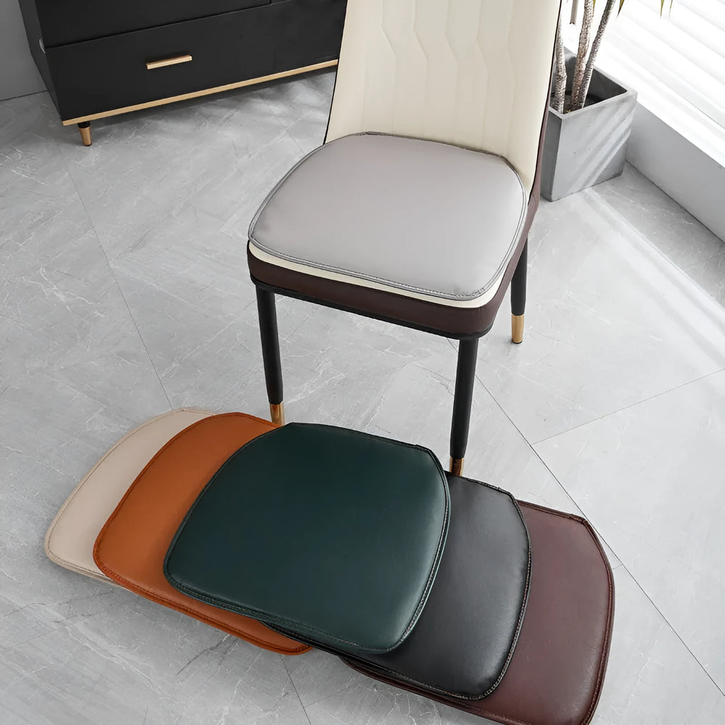 Leather horseshoe-shaped seat cushion in beige colour showing curved design and non-slip underside