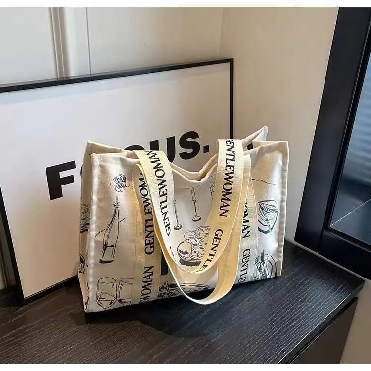 Large capacity cotton canvas tote bag with printed design options including black letter, coloured letter and pattern styles