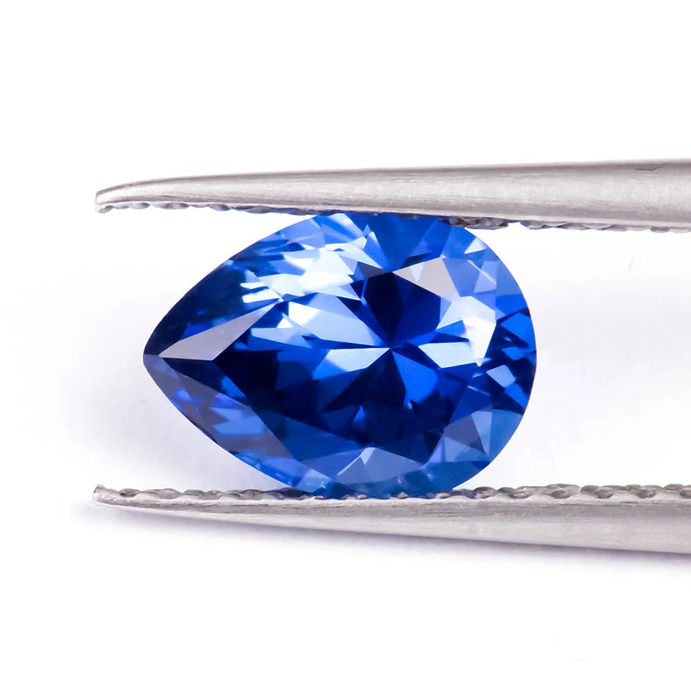 Royal blue heart-shaped tiara design cultivated gemstone on a white background