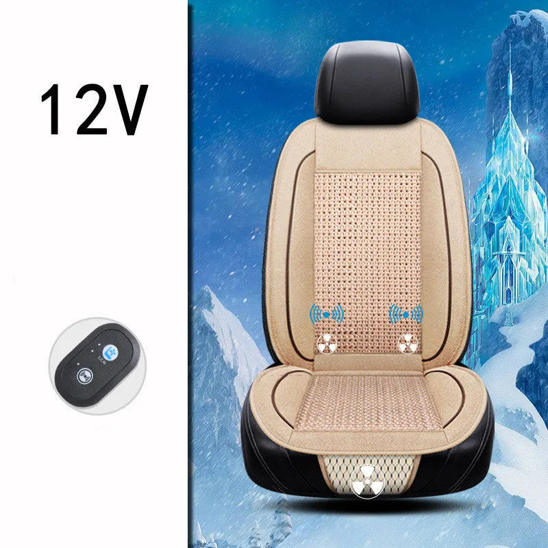 Square black car ventilation seat cushion on a car seat with a connected power cord.