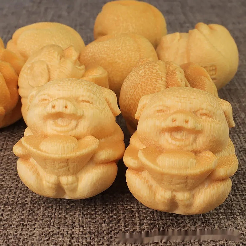 Solid bamboo carving Fulu pig ornament measuring 4cm tall with 3.5cm diameter