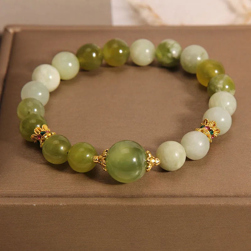 Xiuyan jade green women's bracelet in an original light luxury Mori style design.