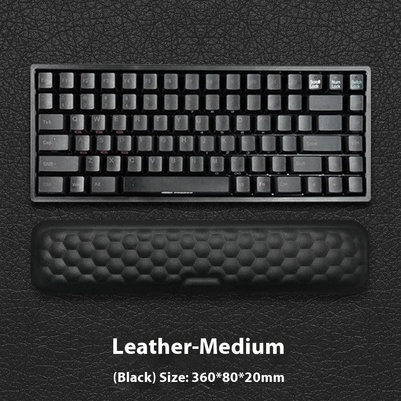 Memory foam mouse wrist rest with silicone base in black cloth and grey leather style options.