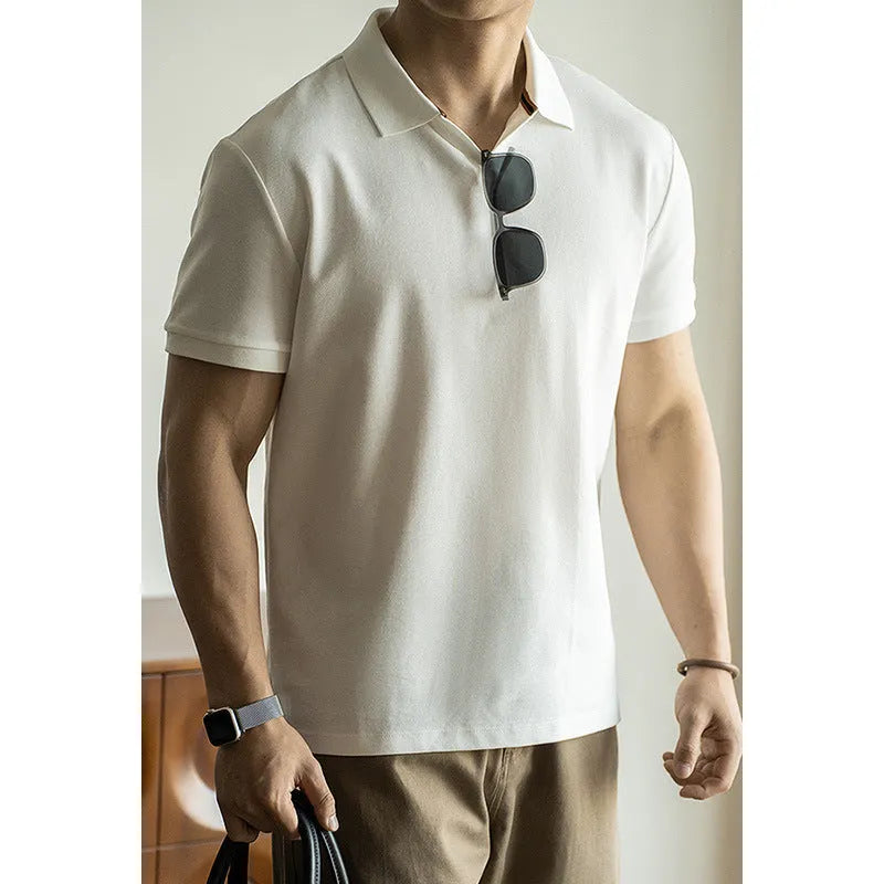 American-style short-sleeved polo shirt in blue cotton blend fabric on hanger
