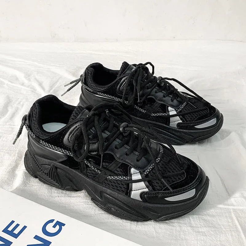 Men's white Korean dad style platform trainers with lace-up front and mesh lining.