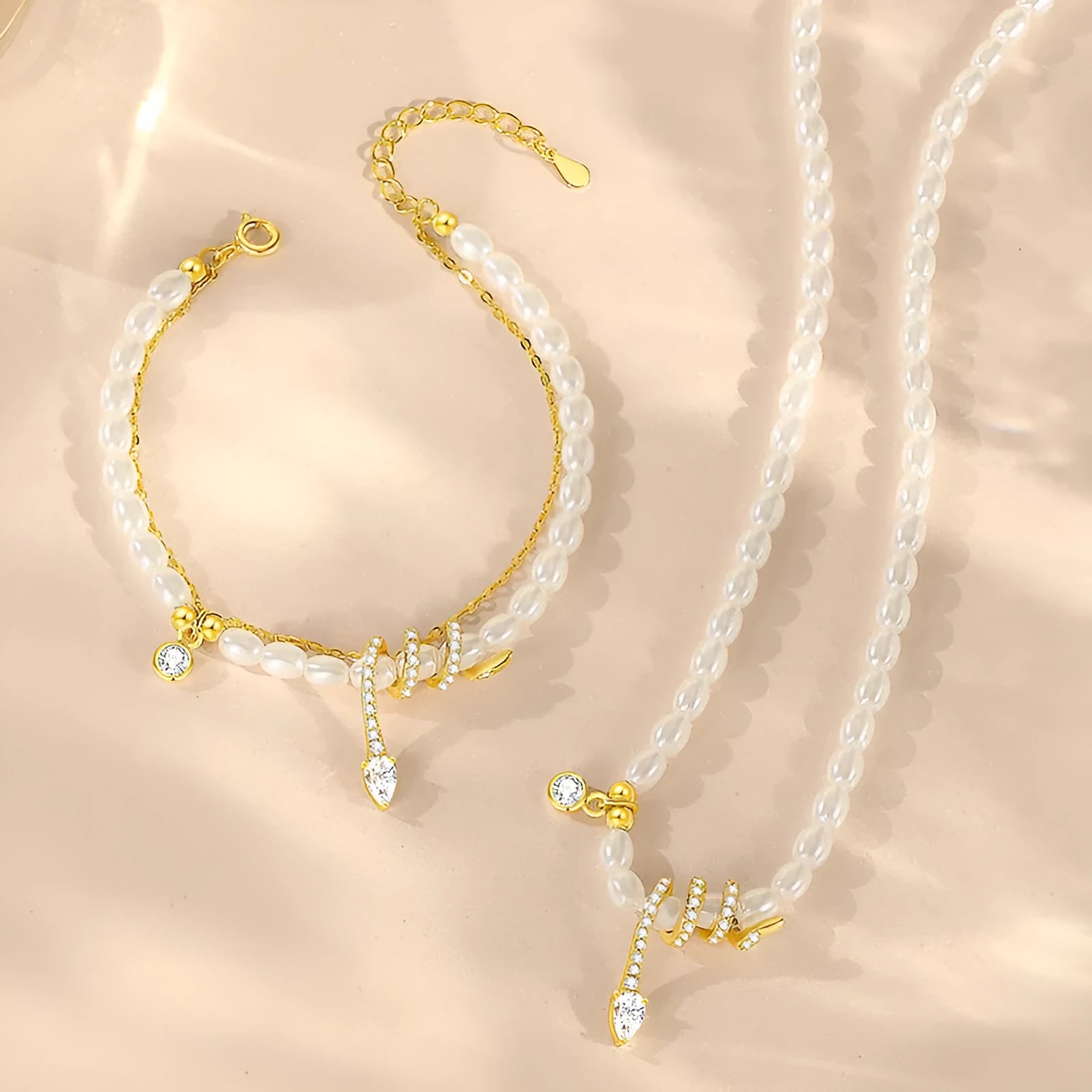 Women's snake motif beaded bracelet in 925 silver with gold or white gold colour finish.
