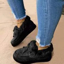 Cotton warm winter slippers with velvet lining and a non-slip rubber sole in a round-toe casual style.