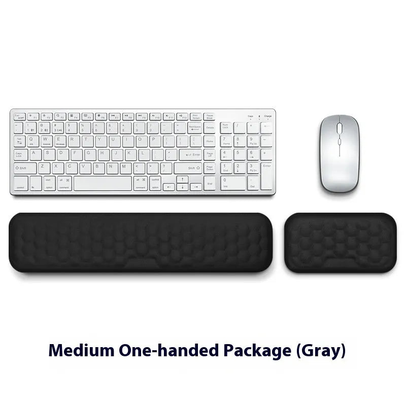 Memory foam mouse wrist rest with silicone base in black cloth and grey leather style options.