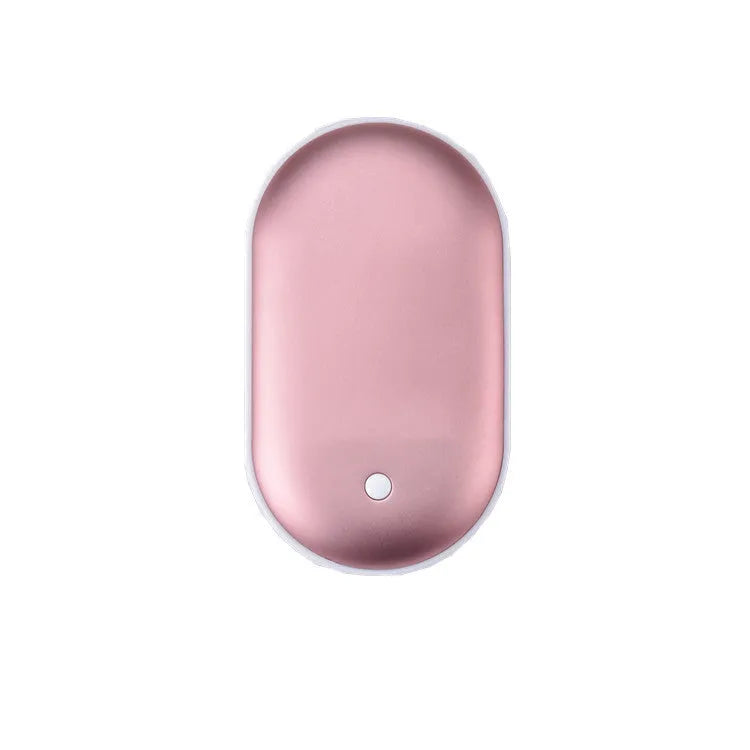 Compact rose gold USB rechargeable hand warmer and power bank with digital display, shown next to its charging cable.
