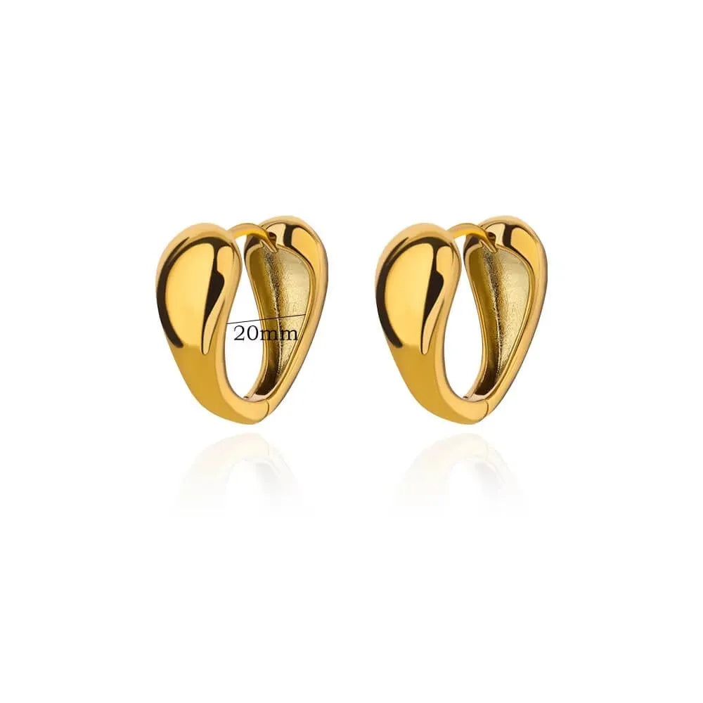Irregular geometric butterfly earrings with heart and star shapes in copper with multiple colour options