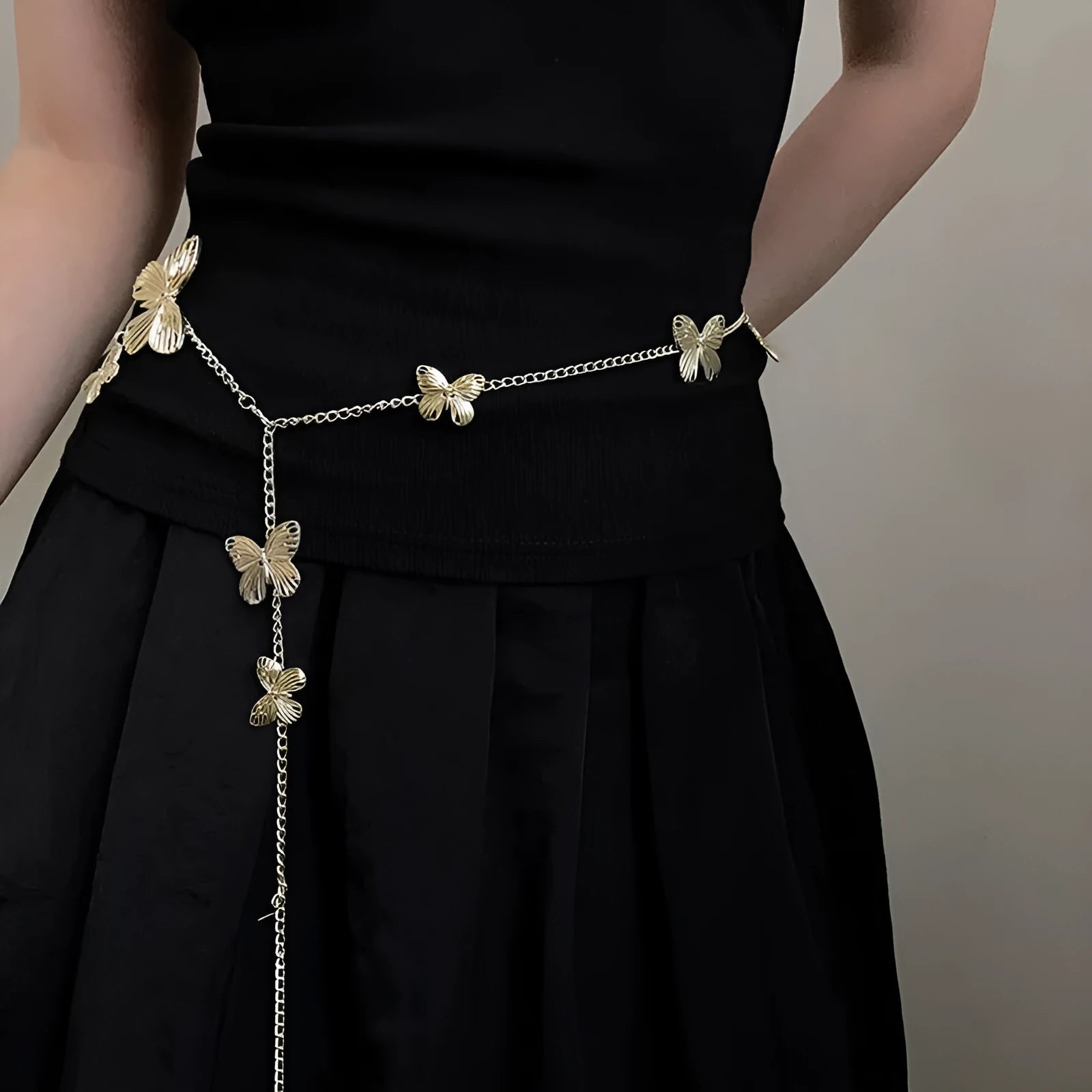 Golden butterfly waist chain accessory with 104cm length and 40mm width on alloy chain