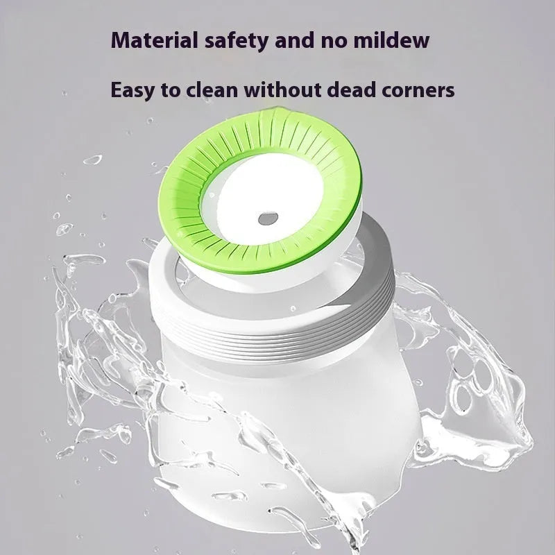 Green raised suspension water bowl for a dog on a white plate