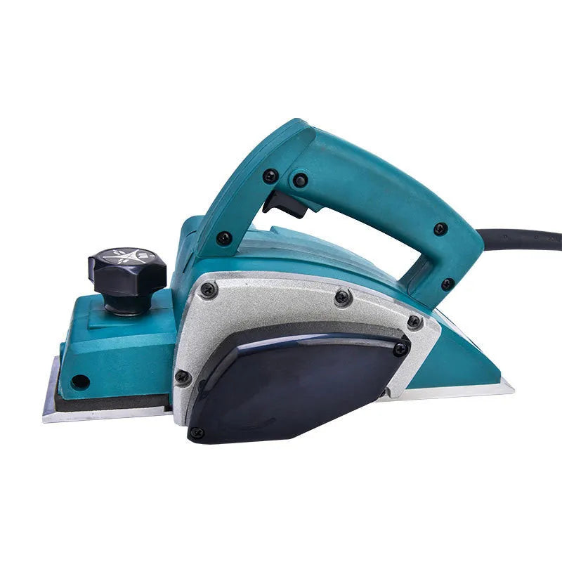Red desktop electric wood planer with aluminium shell showing 82mm cutting width