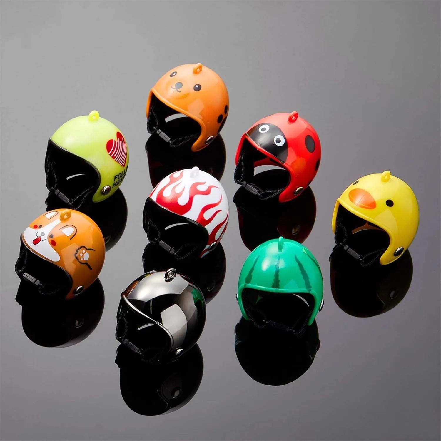 Small adjustable plastic safety helmet for a chicken or bird, shown in a fun design.