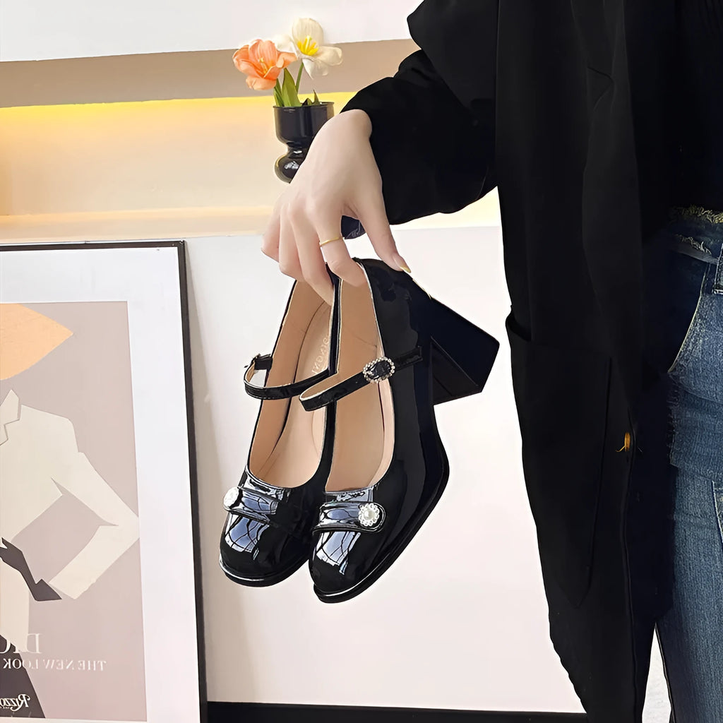 Women's black patent leather wide fit heels with chunky block heel and round toe design