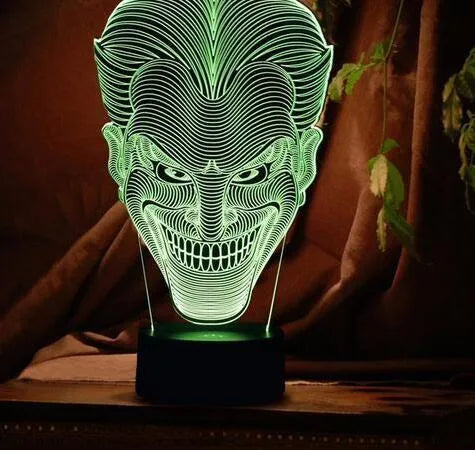 USB-powered 3D acrylic LED table lamp showing multiple colour options and remote control.