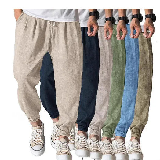 Men's cotton ankle banded trousers in light green colour showing loose fit and summer casual styling