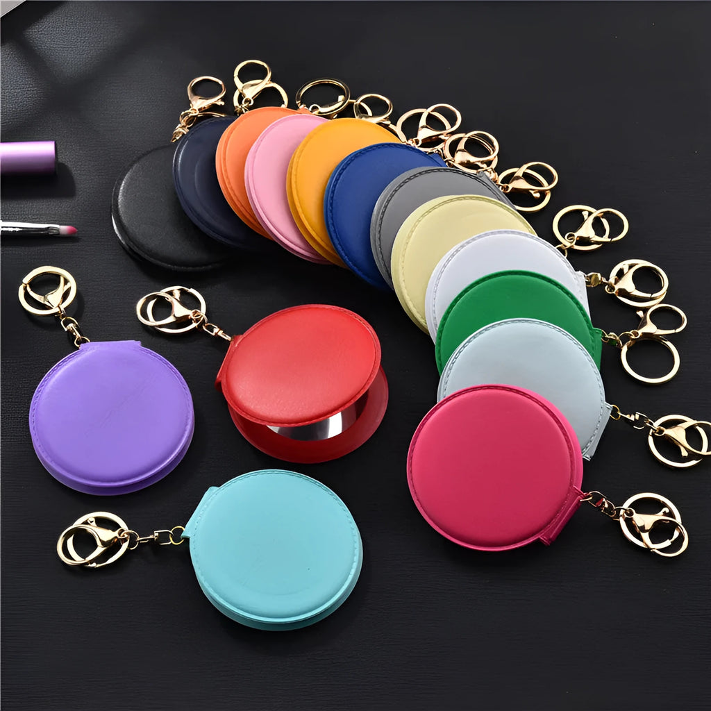 Compact round ladies leather makeup mirror with 8cm diameter glass surface and golden buckle