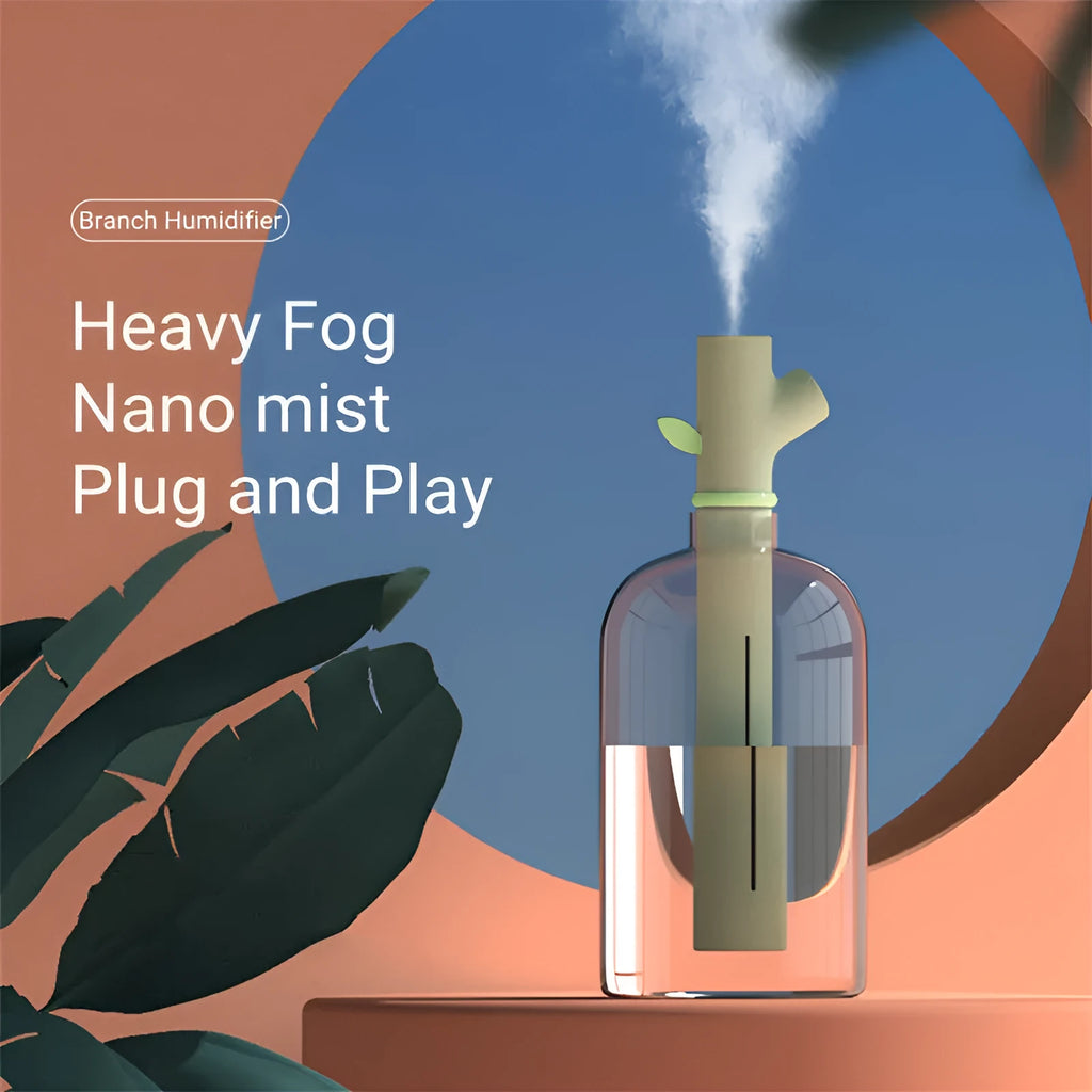 Transparent plastic USB humidifier with branch design and water visible inside