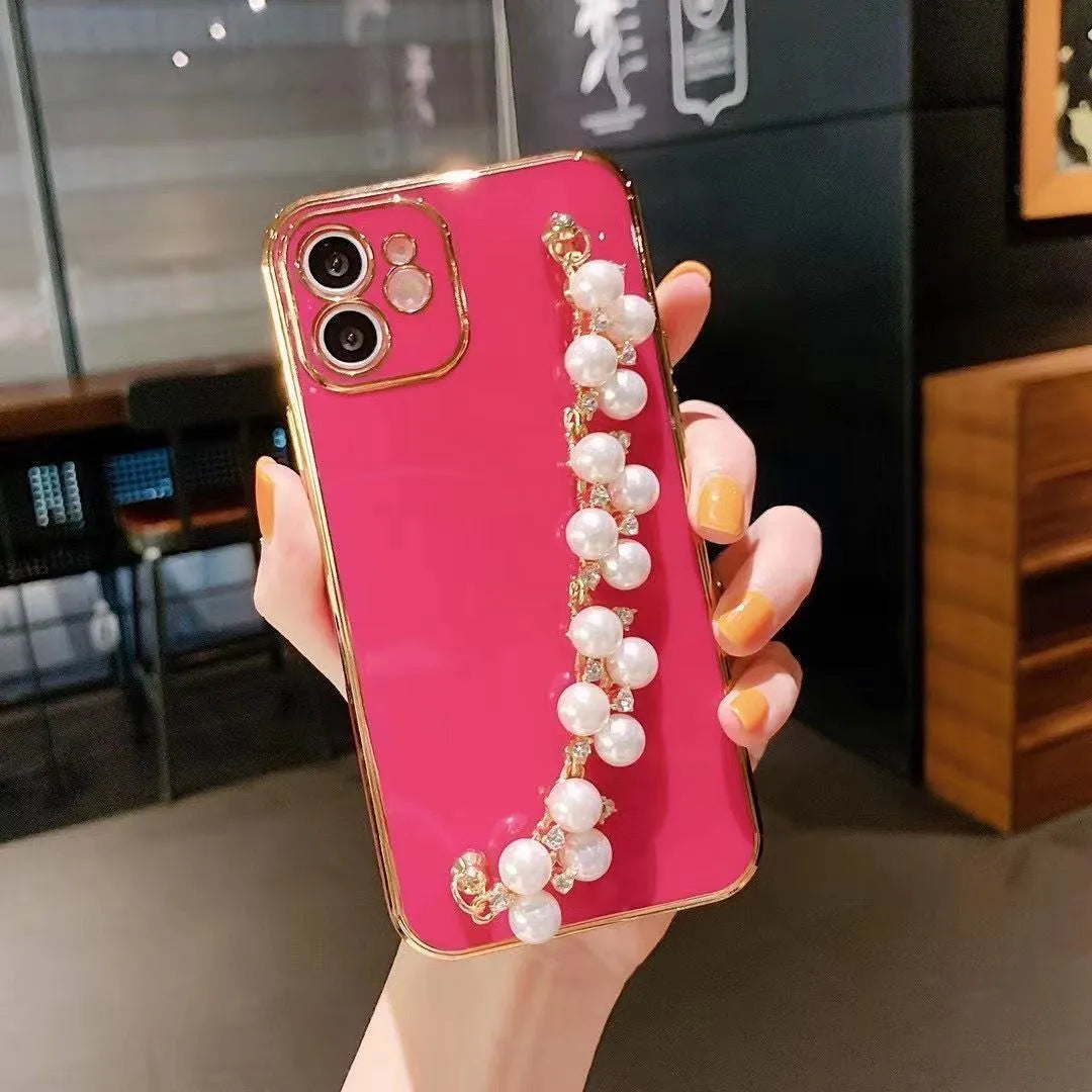Electroplated pearl bracelet silicone phone case for Apple 15, all-inclusive cover with chain detail, black shell