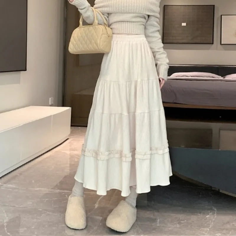 Women's solid colour corduroy A-line midi skirt with elastic waistband in milky white