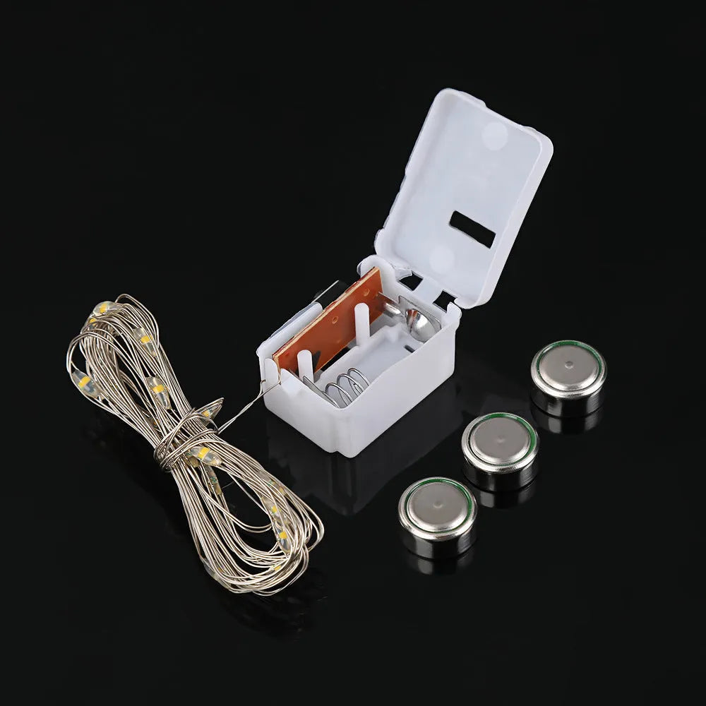 2m LED copper wire string light with three-gear colour options in small white box