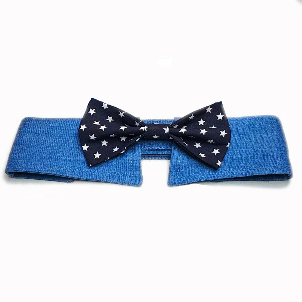 Blue denim dog collar with a star-pattern bow tie, shown with a fastener tape closure.