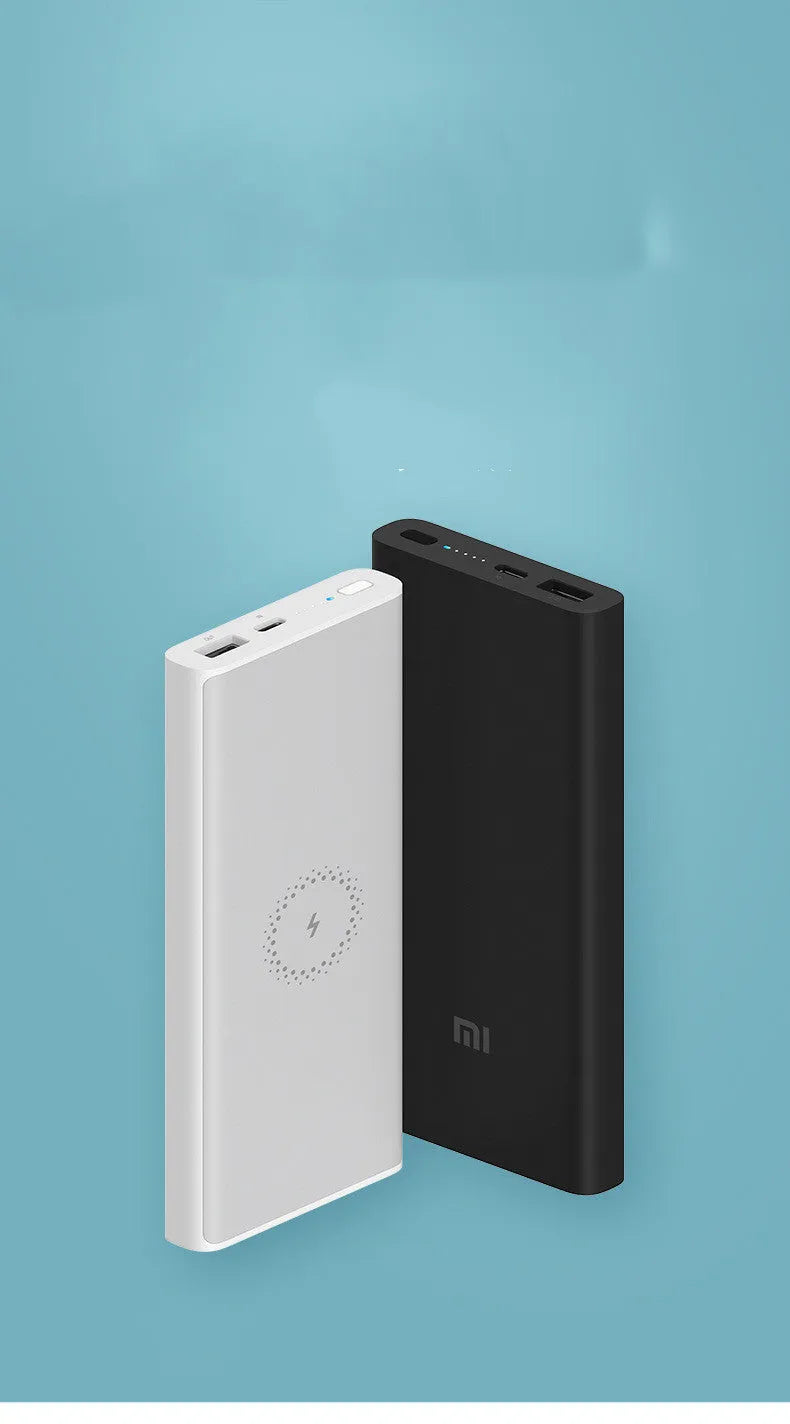 Black and white 10000mAh capacity power bank with wireless charging and fast charge support.