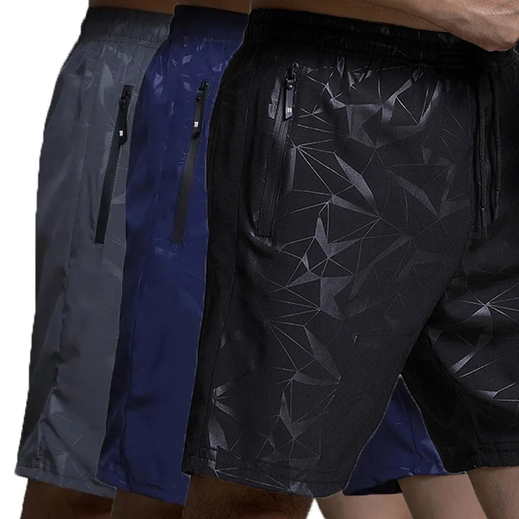 Men's loose-fit sports shorts in polyester with elastic waistband, available in black grey blue colours
