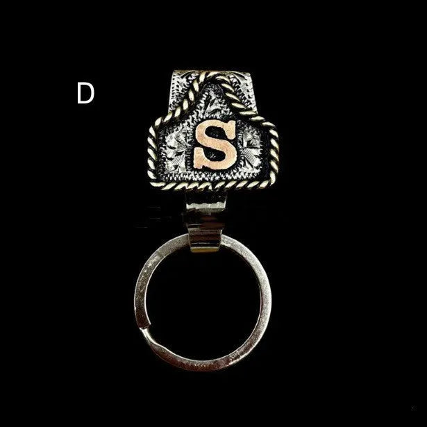 Handmade metal cow tag belt keychain in a selected colour from the A-Z letter range.