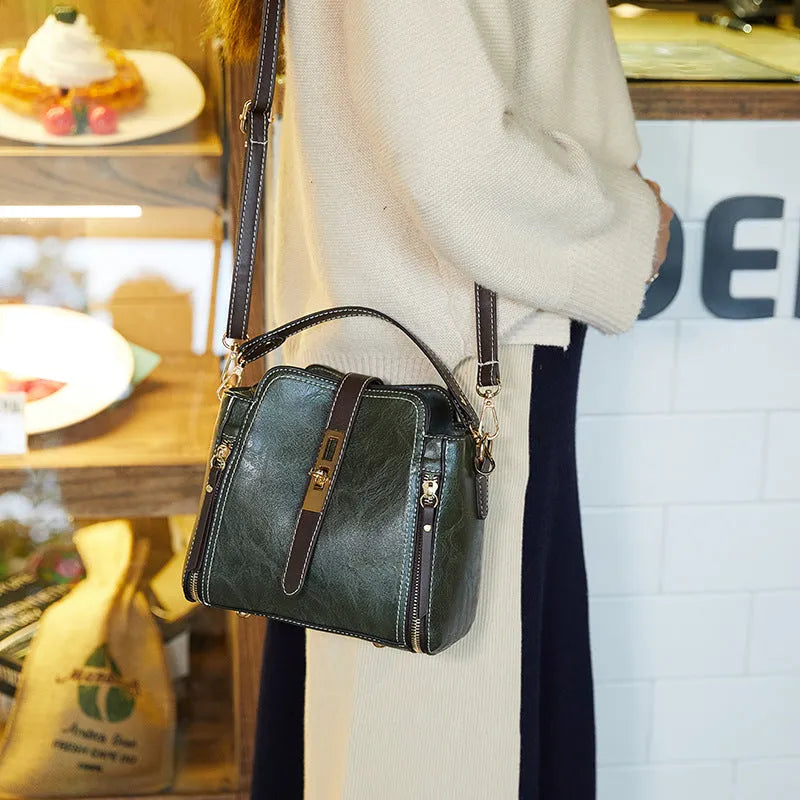 Women small faux leather shoulder bag with detachable strap and turn-lock closure, black colour
