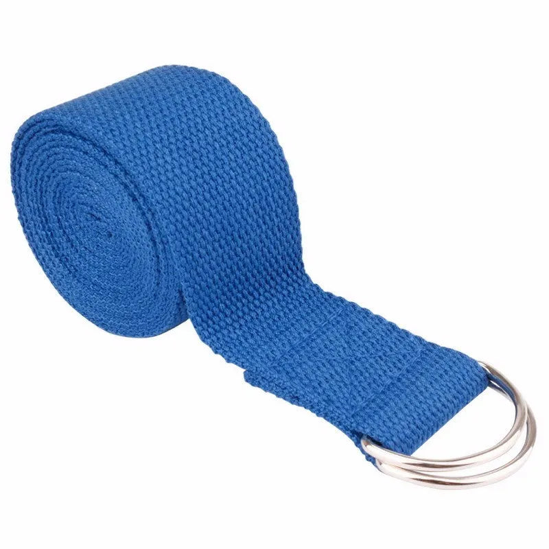Pure colour EVA yoga brick, thick non-slip mat, and cotton tension band on a floor, in blue, purple, pink, red, black, gray