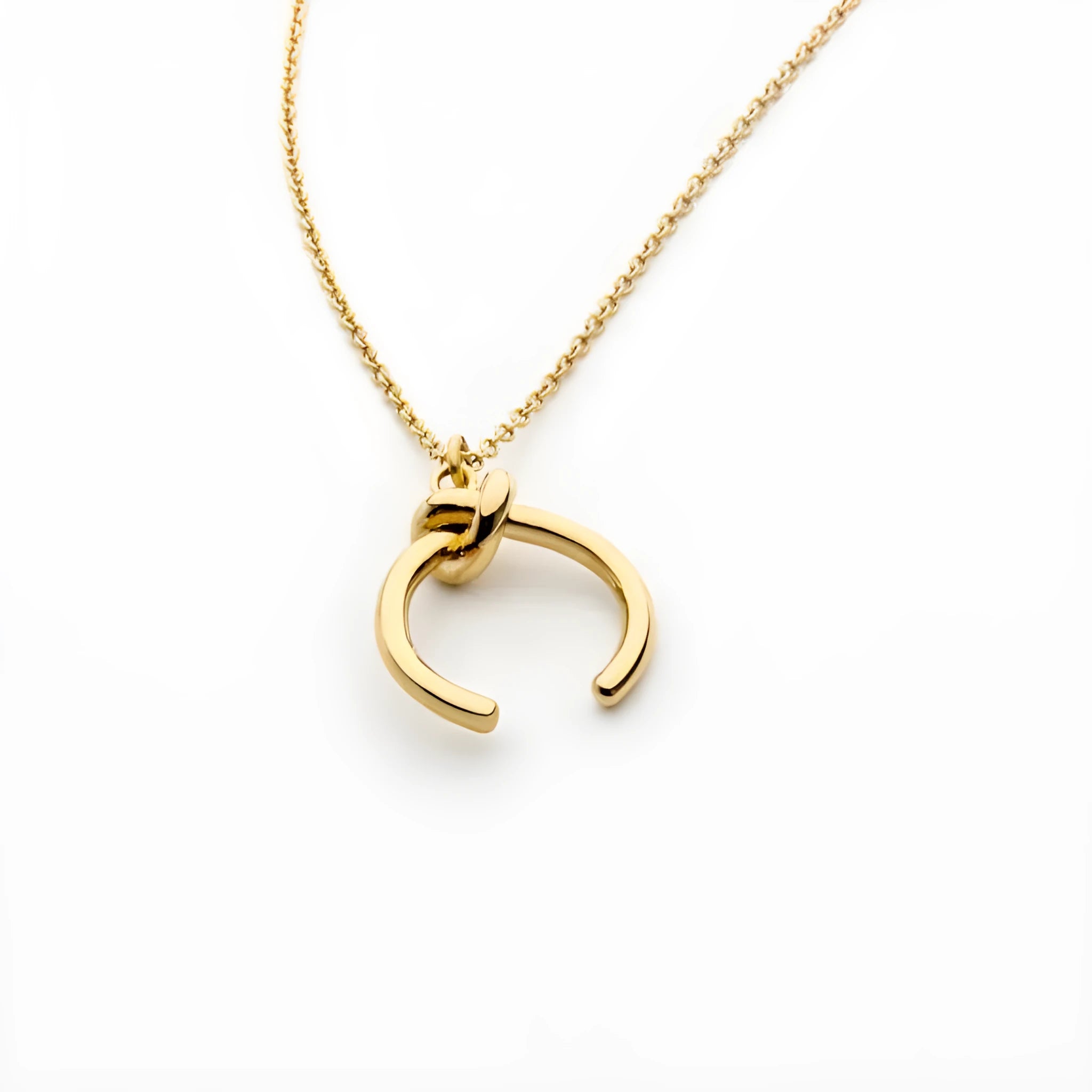 Geometric copper pendant necklace on an adjustable cross chain in gold or silver finish