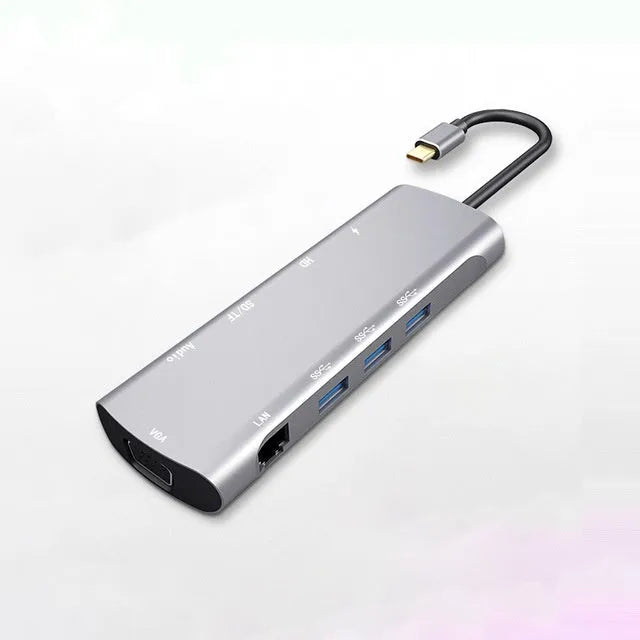 Grey aluminium USB-C docking station with HDMI, VGA, and USB 3.0 ports