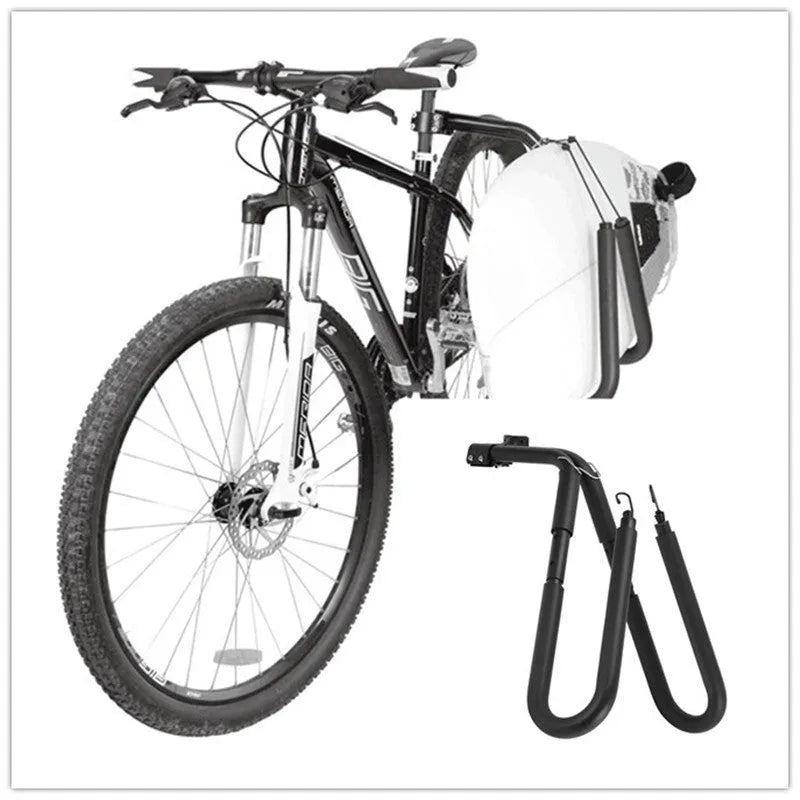 Black aluminium bicycle surfboard hanger bracket on a bike with surfboard attached