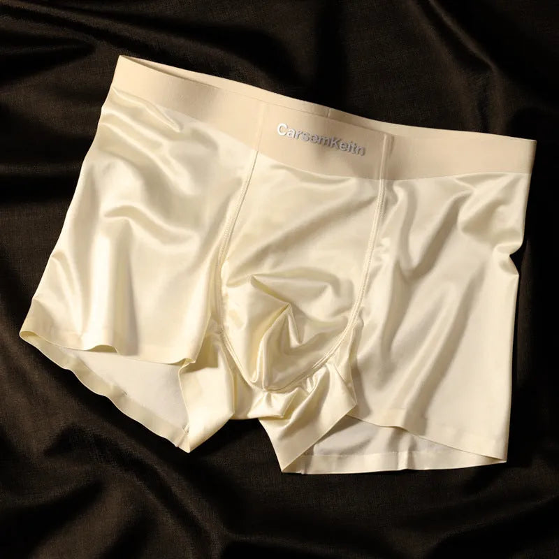 Men's solid colour ice silk seamless underwear laid flat, showing its knit construction.