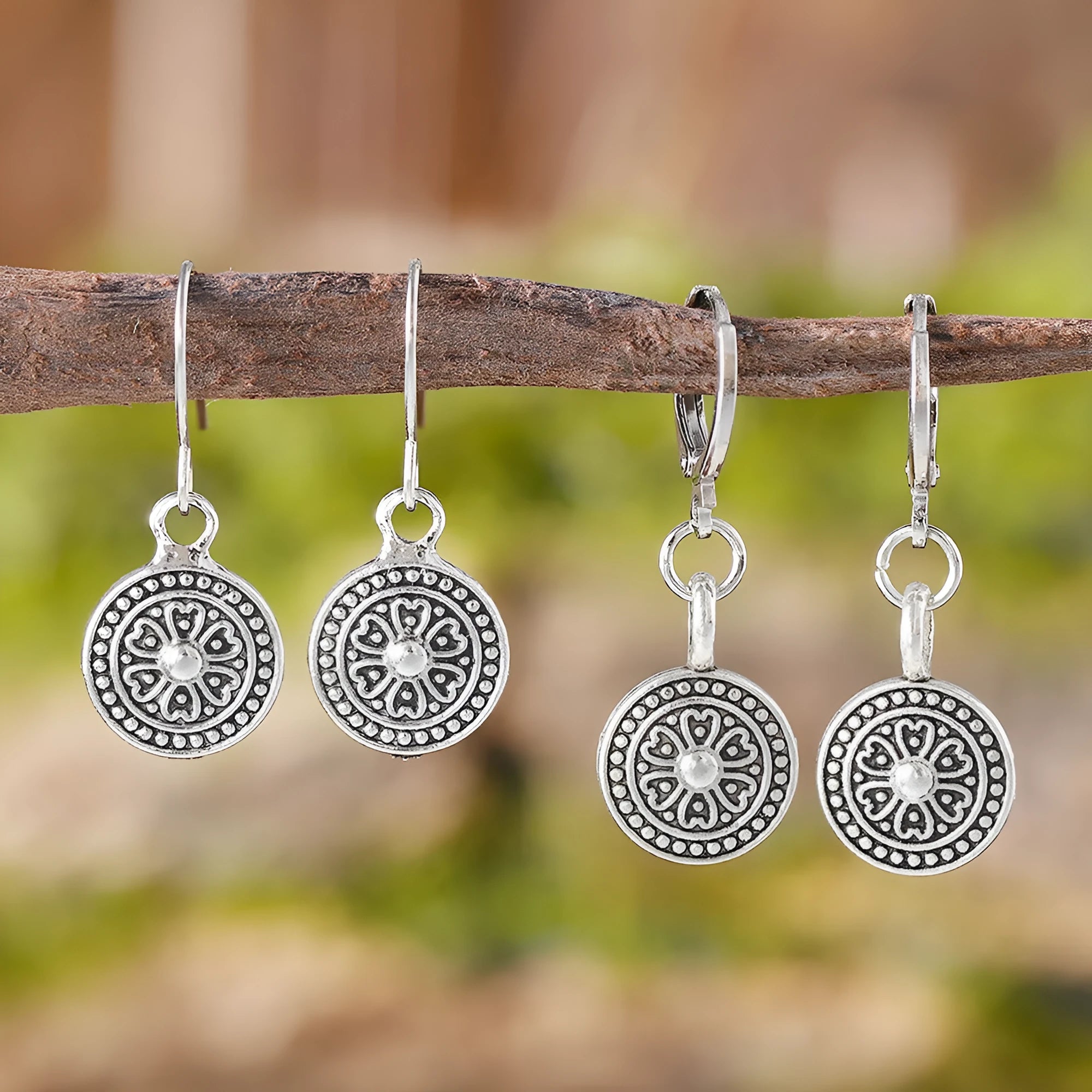 A pair of bohemian retro style earrings with a distressed geometric round print, made from electroplated zinc alloy.